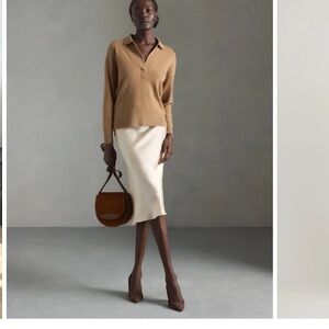 Cream Knee-High Boots and Rust Midi Skirt